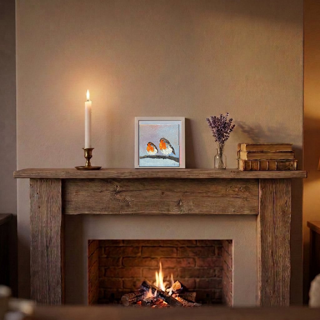 In situ — sitting on a mantelpiece, shown in a slim white frame, approximately 15 × 15 cm framed